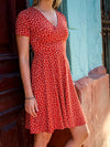 Robe Caroline - Fleurs blanches sur fond orange brûlé