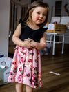 Robe Abi (enfant) - Haut noir, jupe fleurs roses sur fond rose