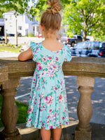 Robe Abi (enfant) - Fleurs sur fond turquoise