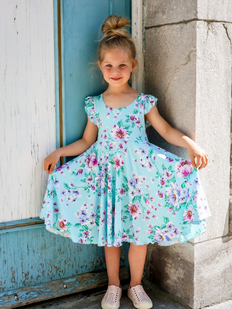 Robe Abi (enfant) - Fleurs sur fond turquoise